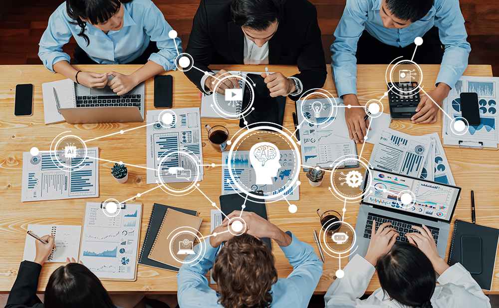 Reunião de equipe analisando dados e tendências, com destaque para o papel da inteligência artificial no mercado de trabalho 
